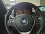 BMW 1-Serie 118i Business | Clima | Navi | Pano | Cruise | PDC & Camera| Stoelverwarming |