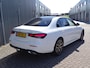 Mercedes-Benz E-klasse 300 e 4MATIC AMG Line AUTOMAAT| SPORT INTERIEUR| NAVIGATIE| 360-CAMERA| DODE-HOEK| MULTIMEDIA| AIRCO/ECC| ADAPTIVE CRUISECONTROLL| XENON/LED| TREKHAAK| SFEER VERLICHTING|