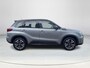 Suzuki Vitara 1.0 Boosterjet Stijl Elektronisch schuif- kanteldak | All seasonbanden | Parkeersensoren voor- en achter | Navigatiesysteem | Afneembare trekhaak | Adaptieve Cruise Control | Climate Control | 36 maanden GARANTIE