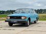 Volvo 100-Serie 142 De Luxe in super retro kleurstelling, handgeschakeld