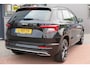 Skoda Karoq 1.5 TSI ACT 150pk Sportline Business Stoelverwarming , Led verlichting , DAB+ radio , Carplay ,Canton sound systeem, Achteruitrijcamera , Parkeersensoren ,Electr. achterklep ,etc.