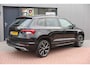 Skoda Karoq 1.5 TSI ACT 150pk Sportline Business Stoelverwarming , Led verlichting , DAB+ radio , Carplay ,Canton sound systeem, Achteruitrijcamera , Parkeersensoren ,Electr. achterklep ,etc.
