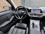 BMW 3-Serie Touring 320e High Executive Automaat | Trekhaak elektrisch | Navigatiesysteem | Laser LED | Draadloze telefoonlader | Apple CarPlay | Getint glas | Metallic lak | Sportleer | Parkeersensoren voor en achter
