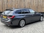 BMW 3-Serie Touring 320e High Executive Automaat | Trekhaak elektrisch | Navigatiesysteem | Laser LED | Draadloze telefoonlader | Apple CarPlay | Getint glas | Metallic lak | Sportleer | Parkeersensoren voor en achter