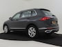 Volkswagen Tiguan Panoramadak l Trekhaak elektr. l Stoel en stuurverwarming l Alcantara Bekleding l Elektr. achterklep l Camera | Achteruitrijcamera | Cruise control adaptief met Stop&Go | Elektrisch glazen panorama-dak