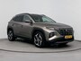 Hyundai Tucson 1.6 T-GDI HEV Premium | Leer | Trekhaak | Trekgewicht 1650kg | Stoel + stuurverwarming | Memory |