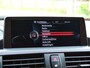 BMW 1-Serie M135i xDrive High Executive ZEER UNIEKE AUTO | Schuifdak | Carbon afwerking | M-performance uitgevoerd | Mosselman stage 1 tuning | Bomvol opties |