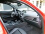 BMW 1-Serie M135i xDrive High Executive ZEER UNIEKE AUTO | Schuifdak | Carbon afwerking | M-performance uitgevoerd | Mosselman stage 1 tuning | Bomvol opties |