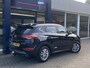 Hyundai Tucson 1.6 T-GDi Comfort / NL-Auto / 1e-Eigenaar / 177 PK / Cruise-Control / Climate-Control / Stoelverwarming V+A / Trekhaak / DAB Radio-Bluetooth / Navi / PDC-Achter met Camera / 17'' LMV / ENZ.