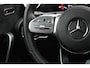 Mercedes-Benz A-klasse 180 136PK AMG LINE AUTOMAAT | PANORAMISCH SCHUIF/KANTEL DAK | KEYLESS ENTRY / GO | NAVIGATIE | ACHTERUITRIJ CAMERA | PARKEERSENSOREN VOOR EN ACHTER | HIGH PERFORMANCE LED KOPLAMPEN | STOEL VERWARMING | SPIEGEL PAKKET | NIGHT PAKKET | LICHTMETALEN VELGEN 19" | STERRENHEMEL | RODE AMG GORDELS |