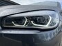 BMW 2-Serie Gran Tourer 216i Business Edition Plus 50% deal 9.975,- ACTIE 7 Persoons / Trekhaak / Leder / Camera / Stoelverwarming