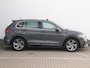Volkswagen Tiguan 1.5 TSI R-Line Business+ | Leder | Panoramadak | Trekhaak | LED Matrix | Stoel- en Stuurverwarming | Navigatie | Dodehoekdetectie | Travel Assist | Keyless |