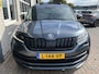 Skoda Kodiaq 1.5 TSI Sportline Business 7p. / AUTOMAAT/ PANO/ ELEK. TREKHAAK/ CAMERA/ PARK. SENSOREN/ MEMORY SEATS/ LED/ VIRTUAL COCKPIT/ KEYLESS/ STOELVERWARM./ SMARTLINK/ NAVI/ CLIMA/ 19" LMV
