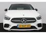 Mercedes-Benz B-klasse 180 Business Solution AMG (PANORAMADAK, STOELVERWARMING, ACHTERUITRIJCAMERA, NAVIGATIE, PARKEERSENSOREN)