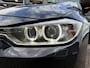 BMW 3-Serie 320i High Executive | AUTOMAAT | XENON | LEER | NAVI | PDC |