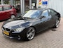 BMW 3-Serie 320i High Executive | AUTOMAAT | XENON | LEER | NAVI | PDC |