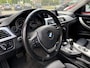 BMW 3-Serie 320i High Executive | AUTOMAAT | XENON | LEER | NAVI | PDC |