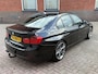 BMW 3-Serie 320i High Executive | AUTOMAAT | XENON | LEER | NAVI | PDC |