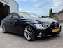 BMW 3-Serie 320i High Executive | AUTOMAAT | XENON | LEER | NAVI | PDC |