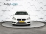BMW 2-Serie Gran Tourer 216i Gran Tourer Essential | Navigatie | Climate Control | Cruise Control