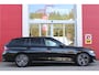 BMW 3-Serie Touring 320e 205PK M-SPORT | PANORAMISCH SCHUIF/KANTEL DAK | M-SPORT PAKKET INTERIEUR/EXTERIEUR | SFEER VERLICHTING | ELEKTRISCH BEDIENBARE VOORSTOELEN MET GEHEUGEN OP DE BESTUURDERSSTOEL | STOEL VERWARMING | HEAD UP DISPLAY | CRUISE CONTROL | NAVIGATIE | DRAADLOZE APPLE CARPLAY/ANDROID AUTO | DRAADLOZE TELEFOONLADER | 18" LICHTMETALEN VELGEN M-SPORT | 360° CAMERA | BMW LIVE DASHBOARD PROFESSIONAL | COMFORT ACCESS | SHADOW LINE PAKKET | FULL LED KOPLAMPEN | NAVIGATIE | CLIMATE CONTROL ACHTERIN |