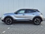 Opel Mokka 1.2 130PK Turbo | AUTOMAAT | Ultimate | Half leder / Alcantara bekleding | Afneembare trekhaak | Achteruitrijcamera | 18 Inch LMV | Stoelverwarming | Adaptieve cruise control | Zwarte hemelbekleding | Achteruitrijcamera | Airco | Armsteun voor