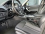 BMW 1-Serie 118i Corporate Lease SPORT AUTOMAAT NAVI BLUETOOTH CRUISE LED HALFLEER 18'' VELGEN MF STUUR