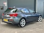 BMW 1-Serie 118i Corporate Lease SPORT AUTOMAAT NAVI BLUETOOTH CRUISE LED HALFLEER 18'' VELGEN MF STUUR