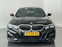 BMW 3-Serie Touring 330i High Executive Edition M-Sport | Individual Citrinschwarz | Apple Carplay/Android Auto | Panoramadak | Getint glas | Head-up display | M Aerodynamica | Stuurwiel verwarmd |