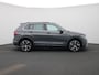 Volkswagen Tiguan 1.4 TSI eHybrid R-Line | 245 PK | SoH 85% | R-line | Automaat | Navigatie | Panoramadak | 360 Camera | Adaptive Cruise Control | Trekhaak | Stoelverwarming | Parkeersensoren | Lichtmetalen velgen | Privacy glass |