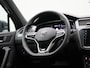 Volkswagen Tiguan 1.4 TSI eHybrid R-Line | 245 PK | SoH 85% | R-line | Automaat | Navigatie | Panoramadak | 360 Camera | Adaptive Cruise Control | Trekhaak | Stoelverwarming | Parkeersensoren | Lichtmetalen velgen | Privacy glass |