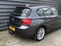 BMW 1-Serie 114i Upgrade Edition / CARPLAY / LEER / KEURIG !