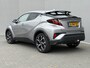 Toyota C-HR 1.8 Hybrid First Edition / Afneembare Trekhaak (Trekgewicht 725kg) / Achteruitrijcamera / Stuur- en Stoelverwarming / Navigatie via Apple Carplay & Android Auto / Cruise- en Climate Control / Keyless Entry & Start /