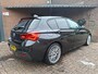 BMW 1-Serie 118i Edition M Sport Shadow Line Panoramadak / Apple Carplay / Stoelverwarming / Cruise Controle /