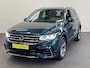 Volkswagen Tiguan 1.4 TSI eHybrid 245pk DSG R-Line Platinum Panoramadak Trekhaak Navigatie Apple Carplay/Android Auto Camera Parkeersensoren Adaptive Cruise Control Matrix Ledverlichting Stoel- en stuurverwarming Climate Control