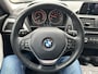 BMW 1-Serie 116i Upgrade Edition AUTOMAAT LEER OPEN DAK