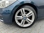 BMW 1-Serie 116i Upgrade Edition AUTOMAAT LEER OPEN DAK