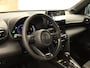 Toyota Yaris Cross 1.5 Hybrid 130 Dynamic - ADAPTIEVE CRUISE CONTROL - NAVIGATIE FULL MAP - APPLE CARPLAY/ANDROID AUTO - EXTRA GETINT GLAS - STUURWIELVERWARMING - STOELVERWARMING - DODEHOEKDETECTIE - CLIMATE CONTROL - KEYLESS ENTRY/START - PARKEERSENSOREN VOOR + ACHTER