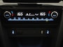 Toyota Yaris Cross 1.5 HYBRIDE EXECUTIVE BI-TONE GARANTIE TOT 9-2032 .Dodehoek detectie . JBL Audio . Stoel verwarming .