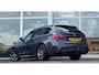 BMW 3-Serie Touring 318i M Sport Pano Harman Kardon Trekhaak Leer Led Mooi!