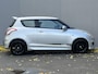 Suzuki Swift 1.2 Exclusive X-ITE / Trekhaak (Trekgewicht 1.000kg) / Elektrisch Glazen Schuif- en Kanteldak / Keyless Entry & Start / Verwarmde Voorstoelen / Cruise- en Climate Control /
