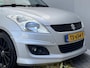 Suzuki Swift 1.2 Exclusive X-ITE / Trekhaak (Trekgewicht 1.000kg) / Elektrisch Glazen Schuif- en Kanteldak / Keyless Entry & Start / Verwarmde Voorstoelen / Cruise- en Climate Control /