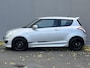 Suzuki Swift 1.2 Exclusive X-ITE / Trekhaak (Trekgewicht 1.000kg) / Elektrisch Glazen Schuif- en Kanteldak / Keyless Entry & Start / Verwarmde Voorstoelen / Cruise- en Climate Control /