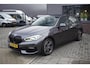 BMW 1-Serie 118i Executive Edition / Stoelverwarming / Intrieurverlichting / Parkeercamera / Carplay / Cruise