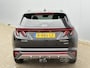 Hyundai Tucson 1.6 T-GDI HEV N Line Sky / Trekhaak (1650kg) / Elektrisch glazen panorama-dak / Kunstlederen/suede bekleding / Stoelverwarming voor/achter / All-season banden /
