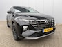 Hyundai Tucson 1.6 T-GDI HEV N Line Sky / Trekhaak (1650kg) / Elektrisch glazen panorama-dak / Kunstlederen/suede bekleding / Stoelverwarming voor/achter / All-season banden /