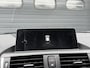 BMW 1-Serie 116d High Executive | Navigatie | Lederen Bekleding | Parkeersensoren | Stoelverwarming |