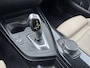 BMW 1-Serie 116d High Executive | Navigatie | Lederen Bekleding | Parkeersensoren | Stoelverwarming |