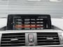 BMW 1-Serie 116d High Executive | Navigatie | Lederen Bekleding | Parkeersensoren | Stoelverwarming |