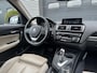 BMW 1-Serie 116d High Executive | Navigatie | Lederen Bekleding | Parkeersensoren | Stoelverwarming |